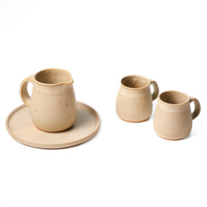 Juego lechero y dos tazas